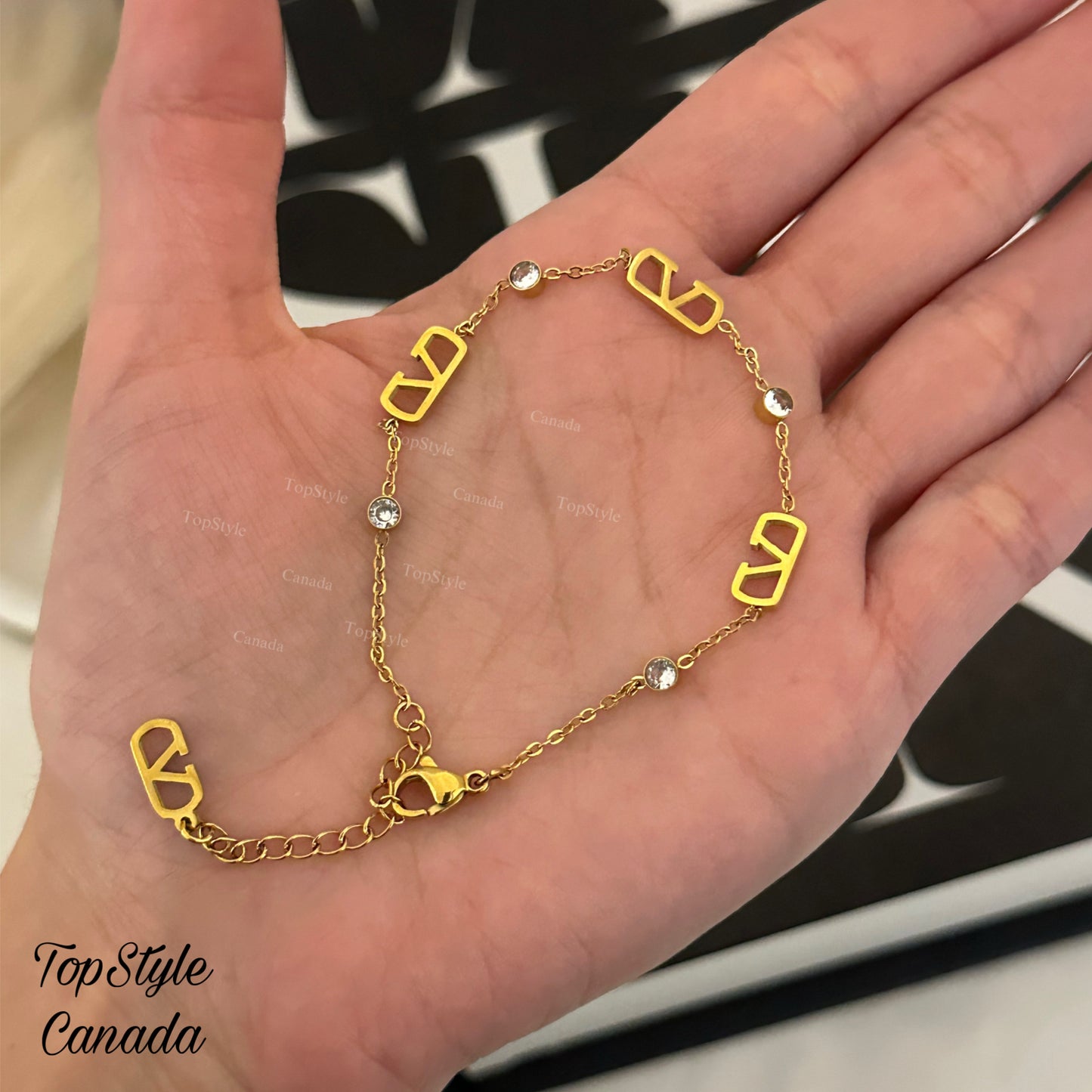 Gold Plated Modern Bracelet with Clear Stones