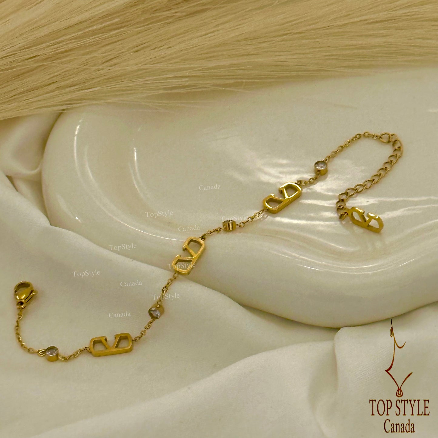 Gold Plated Modern Bracelet with Clear Stones